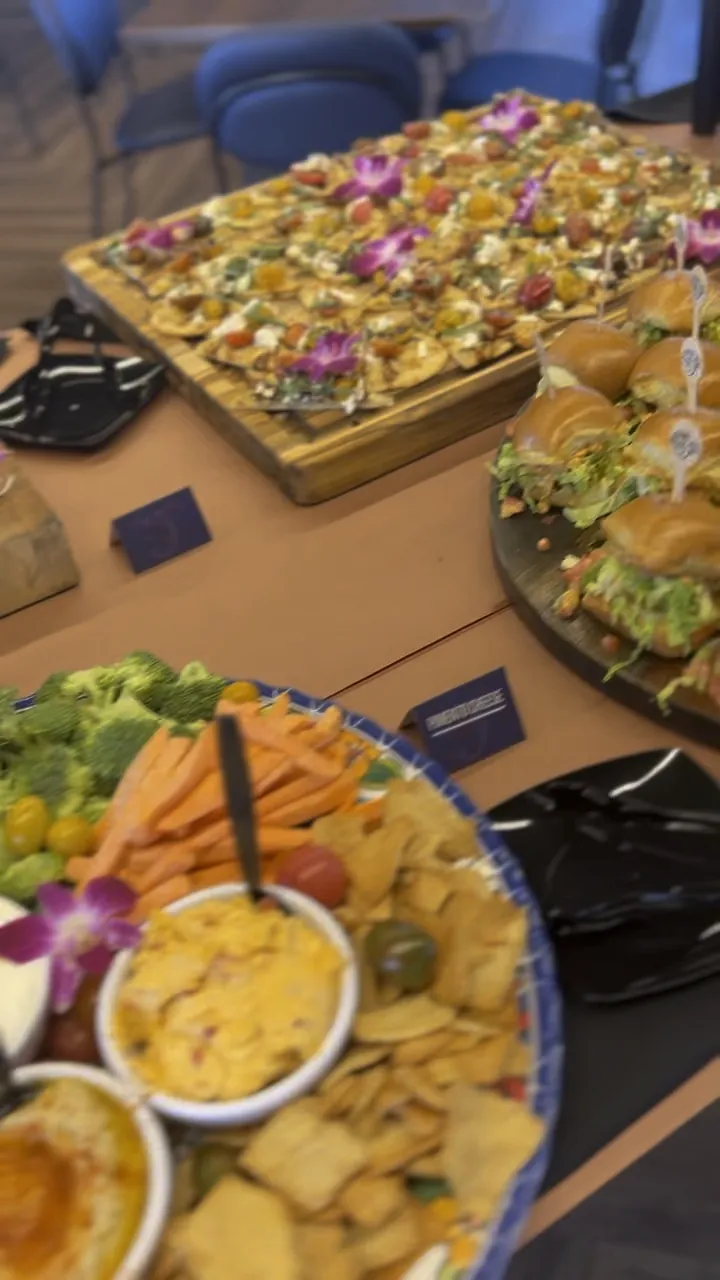 Reception spread with sliders, boards and seafood